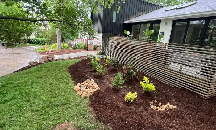 New planting bed with mulch and shrubs by Atlanta landscapers